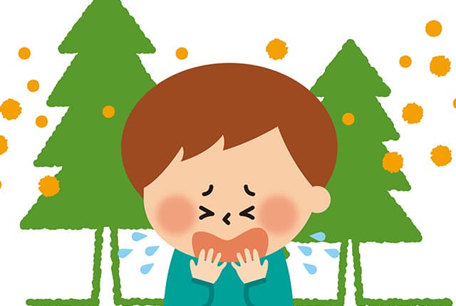 花粉症でくしゃみが出ている様子